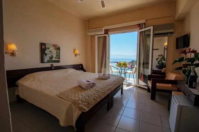 غرفة قياسية بسريرين منفصلين بإطلالة على البحر، Aegli Hotel 1/1