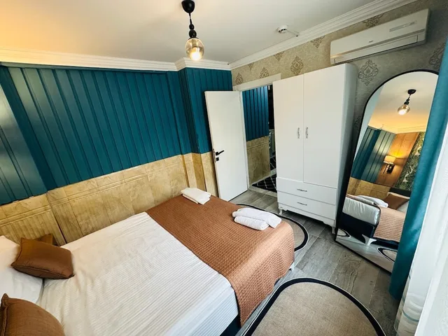 دوبلكس كومفورت بسريرين كوين بإطلالة على المسبح بشرفة مع أريكة، Royal Loft Suit 7/10