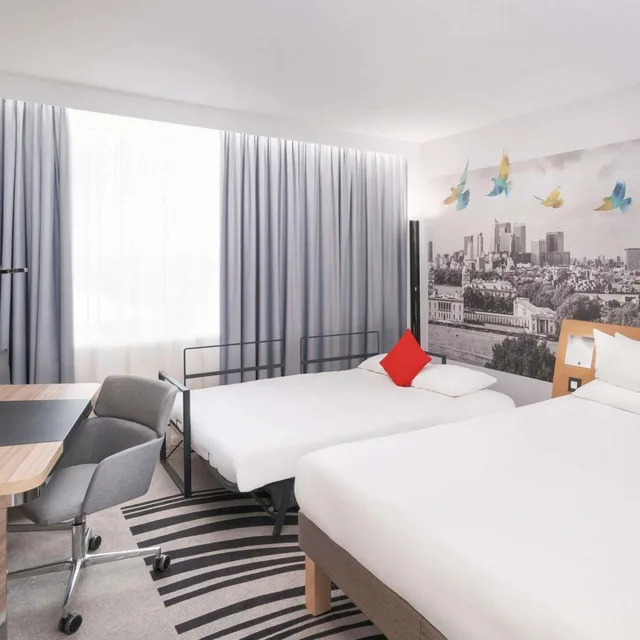 غرفة عائلية بسرير مزدوج وسرير فردي مع أريكة، Novotel Valence Sud 3/7