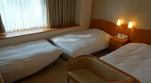 غرفة ثلاثية بثلاثة أسرّة وسريرين مع سرير إضافي، Kobe Luminous Hotel 1/3