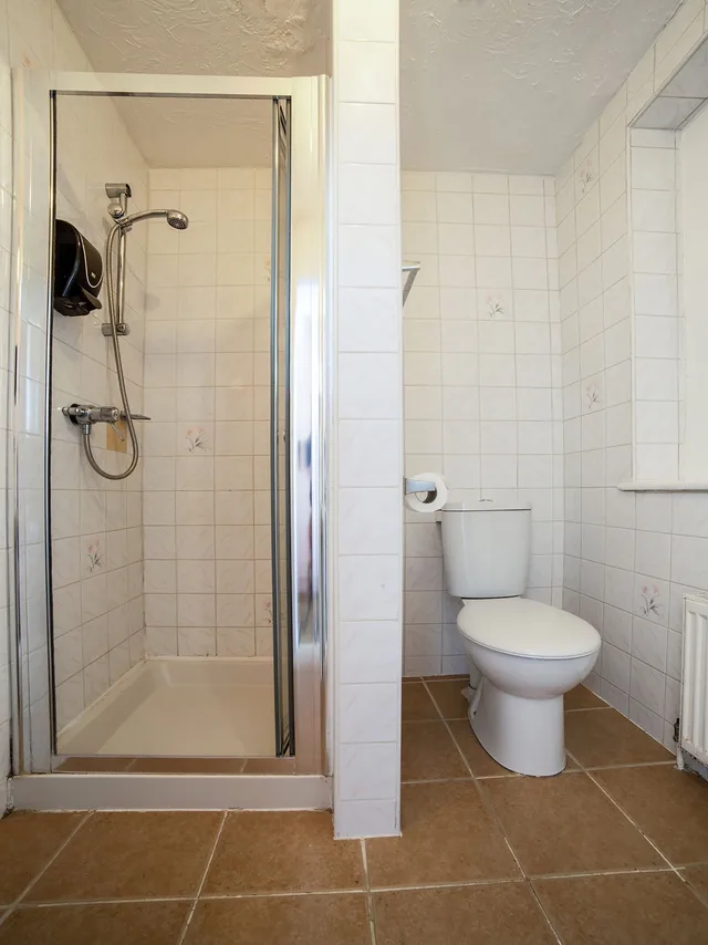 Family, 1 Double and 1 Single Bed, OYO The Strand Hotel 4/6