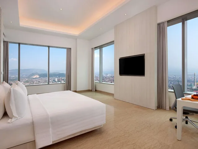 جناح غراند بسرير كينج وسريرين منفصلين، Grand Mercure Lampung 1/2