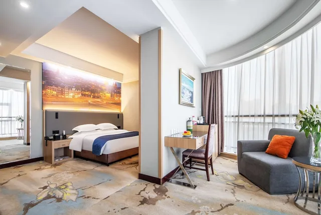 غرفة بزنس بسرير كينج، Ramada by Wyndham Linyi North 2/3