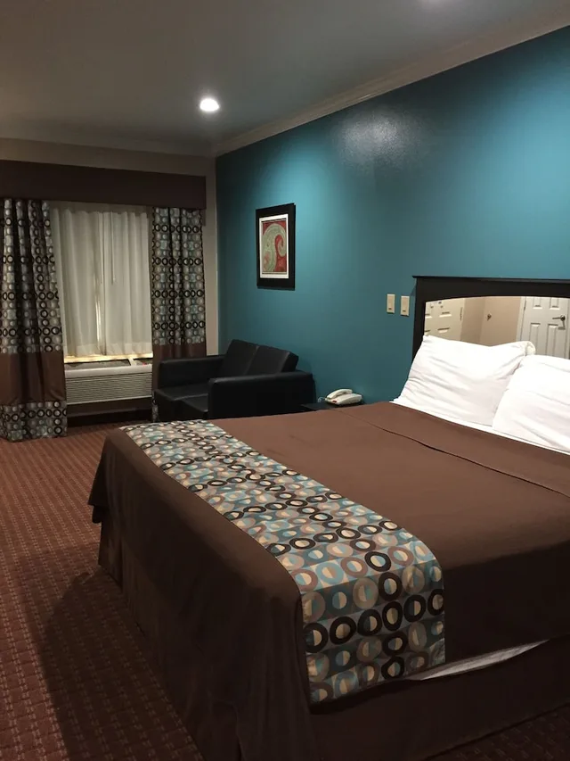 غرفة ديلوكس مفردة بسرير كينج، Scottish Inns Suites Timber Creek Houston 2/3