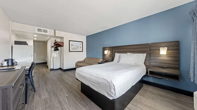 Suite, 2 Double Beds, Sofa, Kitchen, SureStay Hotel by Best Western Virginia Beach Royal Clipper 1/9