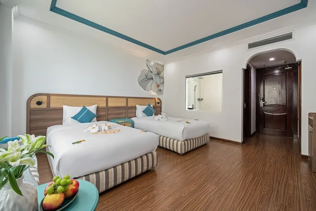 غرفة بريميوم بإطلالة جزئية على البحر، PARACEL DANANG HOTEL 3/5