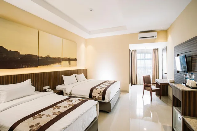 غرفة عصرية ديلوكس ثلاثية بسرير كوين وسرير فردي، Grand TW Batam Center Hotel & Convention 1/1