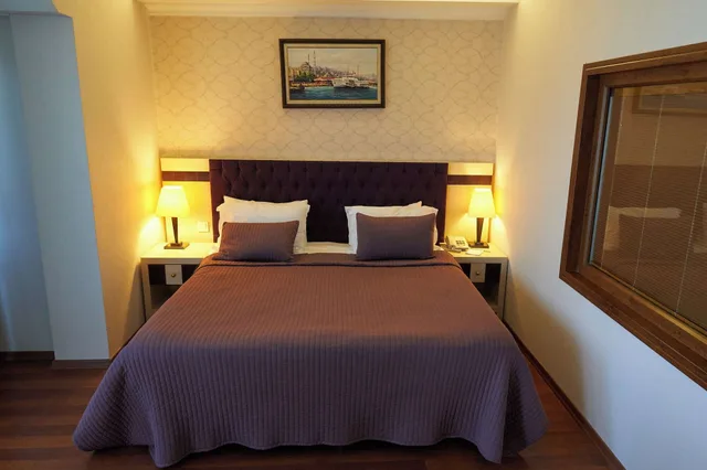 جناح بريميوم بسرير كينج بإطلالة على البحر بشرفة، Phellos Suites 1/5