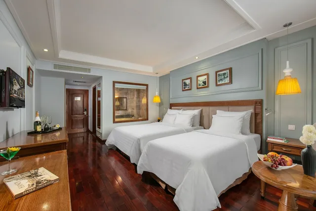 غرفة ديلوكس ثلاثية بسرير كوين وسرير فردي بإطلالة على المدينة، Hanoi Pearl Hotel 4/10