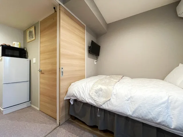 غرفة عائلية بسريرين منفصلين في المبنى الرئيسي، Shinjuku Warm House 3/10