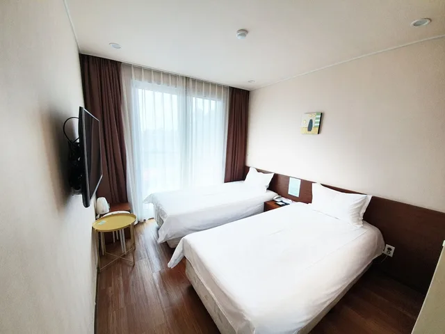 غرفة اقتصادية مفردة بسريرين منفصلين، Jeju Ocean Blue Hotel 3/5