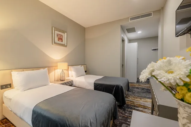 غرفة قياسية بسريرين منفصلين بإطلالة على المدينة بشرفة، Brosse Garden Hotel 10/10