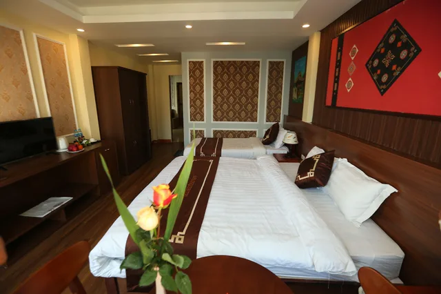 غرفة ديلوكس ثلاثية بسرير مزدوج وسرير فردي، Sapa Unique Hotel 3/4