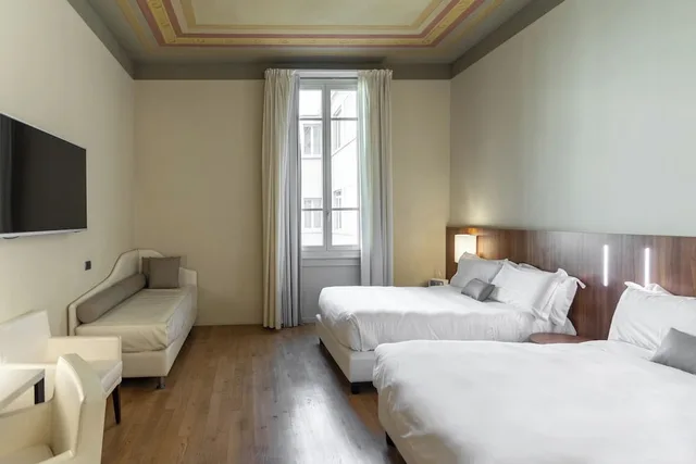غرفة عائلية بسريرين مزدوجين مع أريكة، I Portici Hotel Bologna 1/2