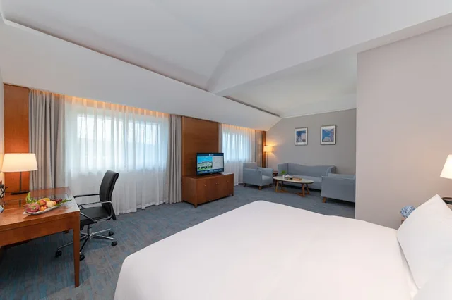 غرفة تنفيذية بسرير كوين، Yihohotel Xiang an Xiamen 2/4