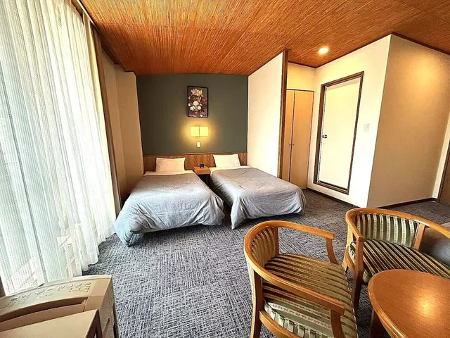 غرفة عائلية رباعية بأربعة أسرّة بإطلالة على البحر، Shinnishiki Hotel 2/6