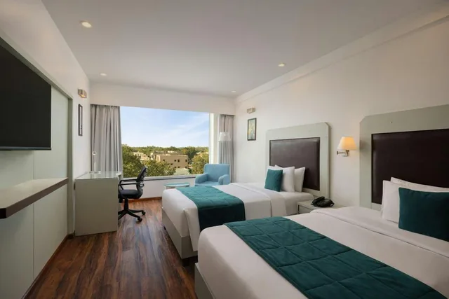Green, Guest Room, Twin Beds, Partial View، The Fern Residency Jodhpur 1/1