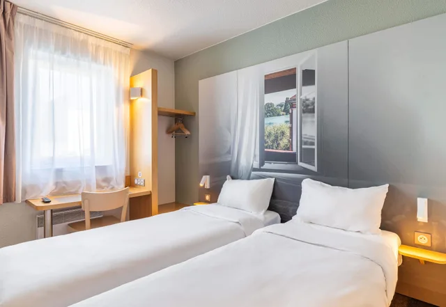 غرفة بسريرين منفصلين، B&B Hotel Lyon Saint Bonnet Mid Plaine 1/5