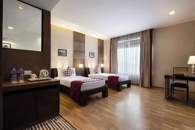 غرفة بسريرين منفصلين للمدخنين، Ramada by Wyndham Ajmer 4/9