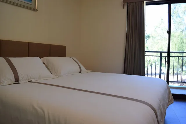 غرفة ديلوكس بسرير كينج بإطلالة على البحر، Saipan Beach Hotel 1/4