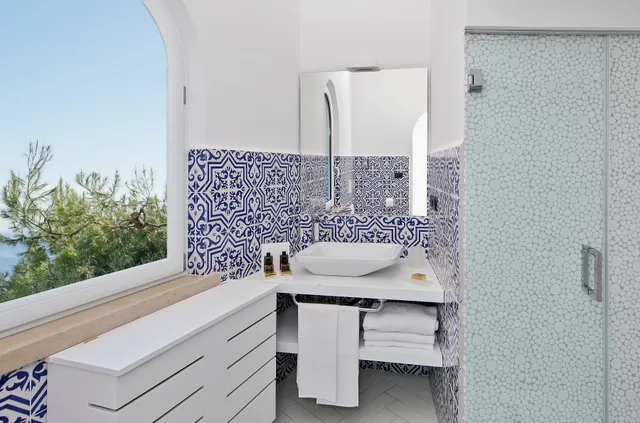 غرفة كلاسيكية بسرير مزدوج بإطلالة على البحر، Le Agavi Hotel 4/4