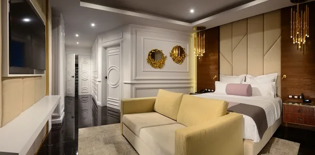 غرفة رئاسية بسرير كينج وسريرين كوين بغرفتي نوم مع أريكة، Hotel and Spa Mansion Solis by Hotsson 2/4