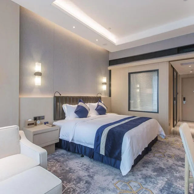 غرفة تنفيذية بسرير كينج بإطلالة على المدينة، Grand Metropark Hotel Liyuan Chongqing 1/5