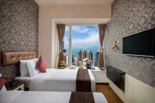 غرفة ديلوكس بسريرين منفصلين بإطلالة على المرفأ، Ramada by Wyndham Hong Kong Harbour View 2/3