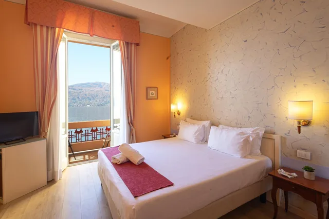 غرفة ديلوكس بسرير مزدوج أو سريرين منفصلين بإطلالة على البحيرة بشرفة، Hotel Pallanza 7/10