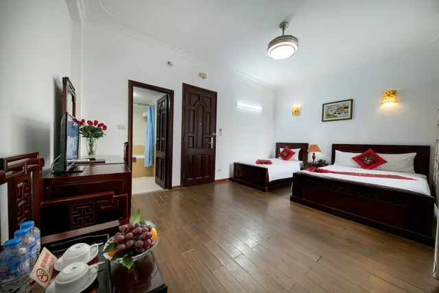 غرفة ديلوكس عائلية بسرير كوين وسرير فردي، Phoenix Legend Hotel 7/10