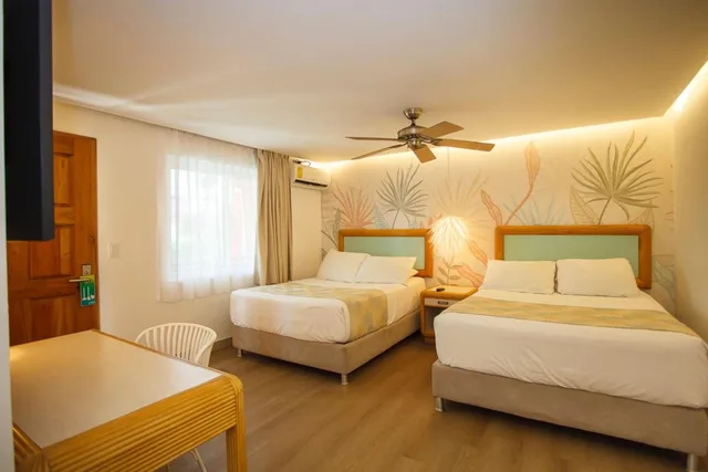 Room, 2 Double Beds, Hotel Cocoplum Beach 1/6