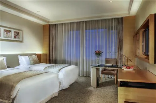 غرفة ديلوكس بسريرين منفصلين، Millennium Hotel Chengdu 1/2