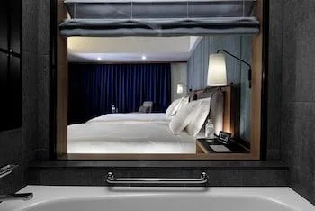 Premium, Single, 2 Double Beds, Executive Lounge Access، Hotel Collective 1/1