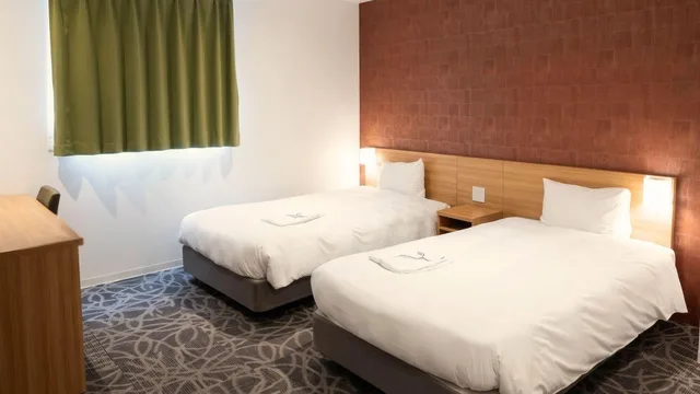 غرفة قياسية بسريرين منفصلين في المبنى الرئيسي، Sakura Garden Hotel 1/2