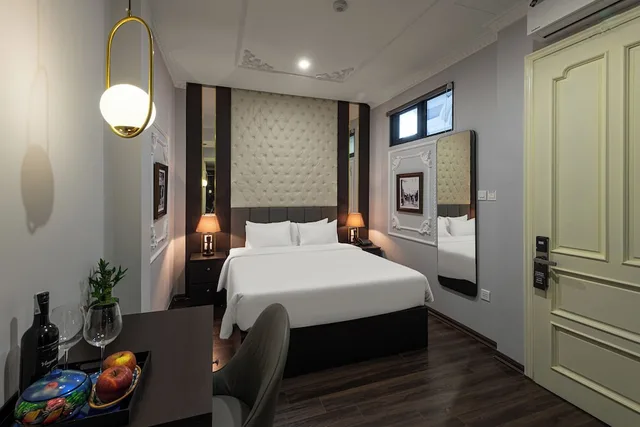 غرفة ديلوكس بسرير كوين بإطلالة على المدينة، Avani Central Hotel Hanoi 3/4