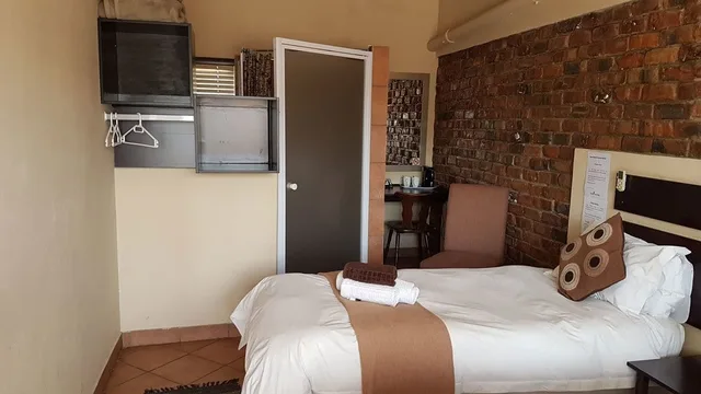 غرفة فاخرة بسرير كينج بغرفة نوم واحدة، Tsessebe Guesthouse 9/10