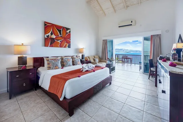 Sunset, Junior Suite, King Bed، Calabash Cove Resort And Spa - Adults Only 1/10