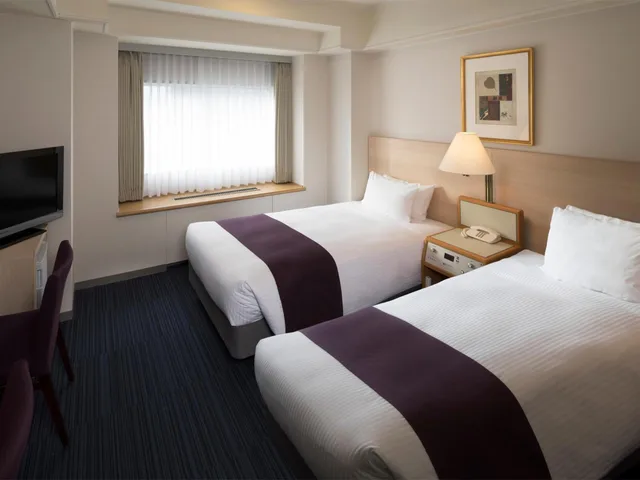 غرفة تُحدَّد عند الوصول مع أريكة، Sapporo Grand Hotel 1/1