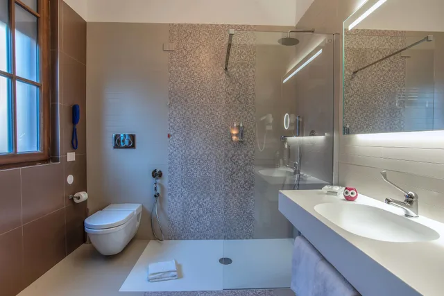 غرفة ثلاثية بسرير كوين وسرير فردي، Albergo Etico Roma 2/2