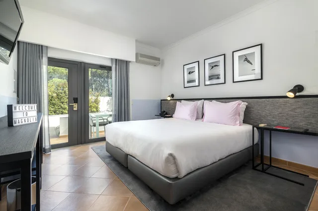 غرفة قياسية بسريرين منفصلين، The Magnolia Hotel 1/7