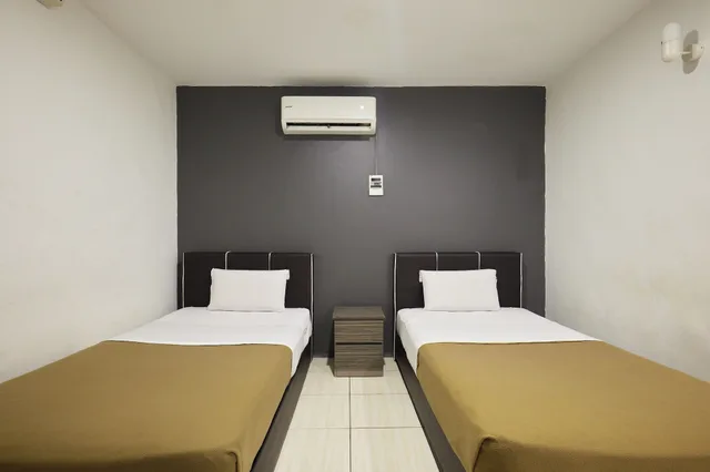 غرفة ديلوكس بسريرين منفصلين، Uncle Guesthouse Kuala Terengganu by ZUZU 3/7
