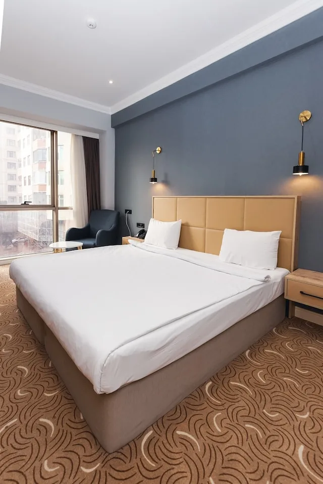 غرفة عائلية بسرير كينج وسريرين منفصلين، Congress Hotel 8/10