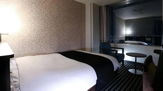 غرفة بسرير نصف مزدوج في طابق مرتفع في المبنى الرئيسي، Apa Hotel and Resort Tokyo Bay Makuhari 1/2