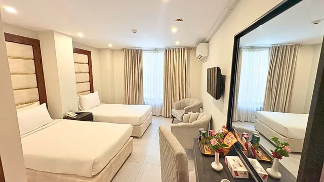 غرفة ديلوكس بسريرين منفصلين، ENVOY CONTINENTAL HOTEL 1/5