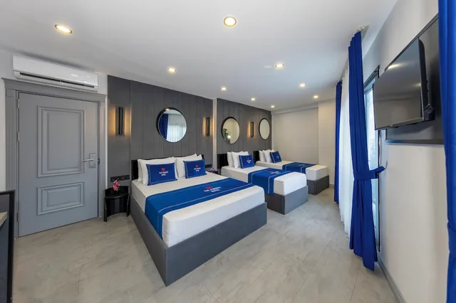غرفة ديلوكس رباعية بسرير كوين وسريرين منفصلين، The Private Airport Hotel 5/7