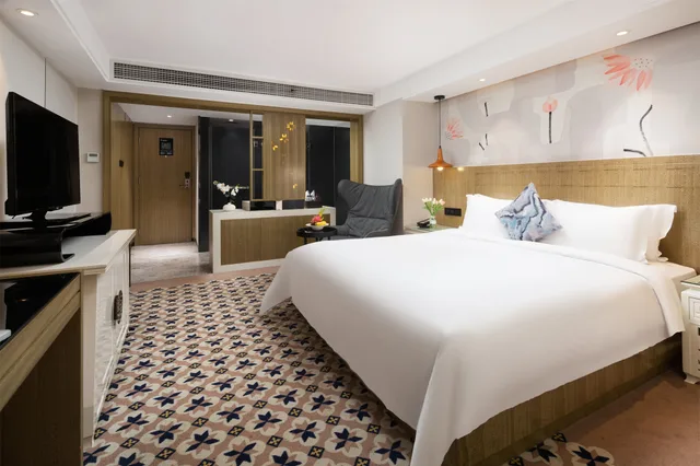 غرفة ديلوكس بسرير مزدوج، Paco Business Hotel Longkou 1/3