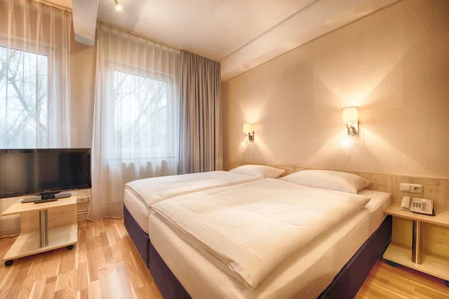 غرفة كومفورت بسرير كوين، Enjoy Hotel Berlin City Messe 4/5