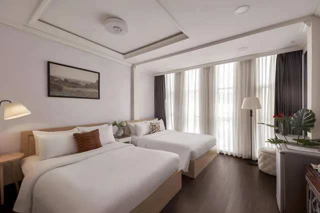 غرفة عائلية بسريرين مزدوجين، Quy Hung Hotel 1/2