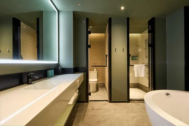 جناح بسرير كينج مع أريكة، Novotel Yinchuan Lanxigu 1/1