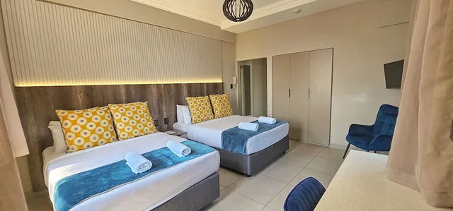 غرفة سوبيريور رباعية بسريرين مزدوجين، The Albany Hotel 1/3